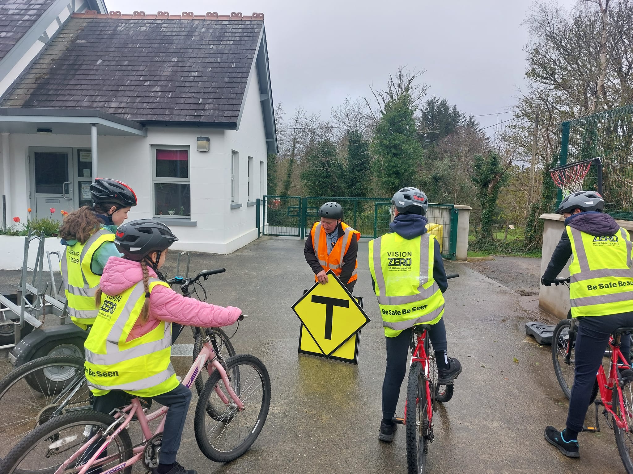 instructor teaching group road signs